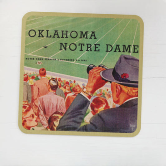 Coaster with illustration of a man using binoculars and text 'Oklahoma Notre Dame' with football stadium art