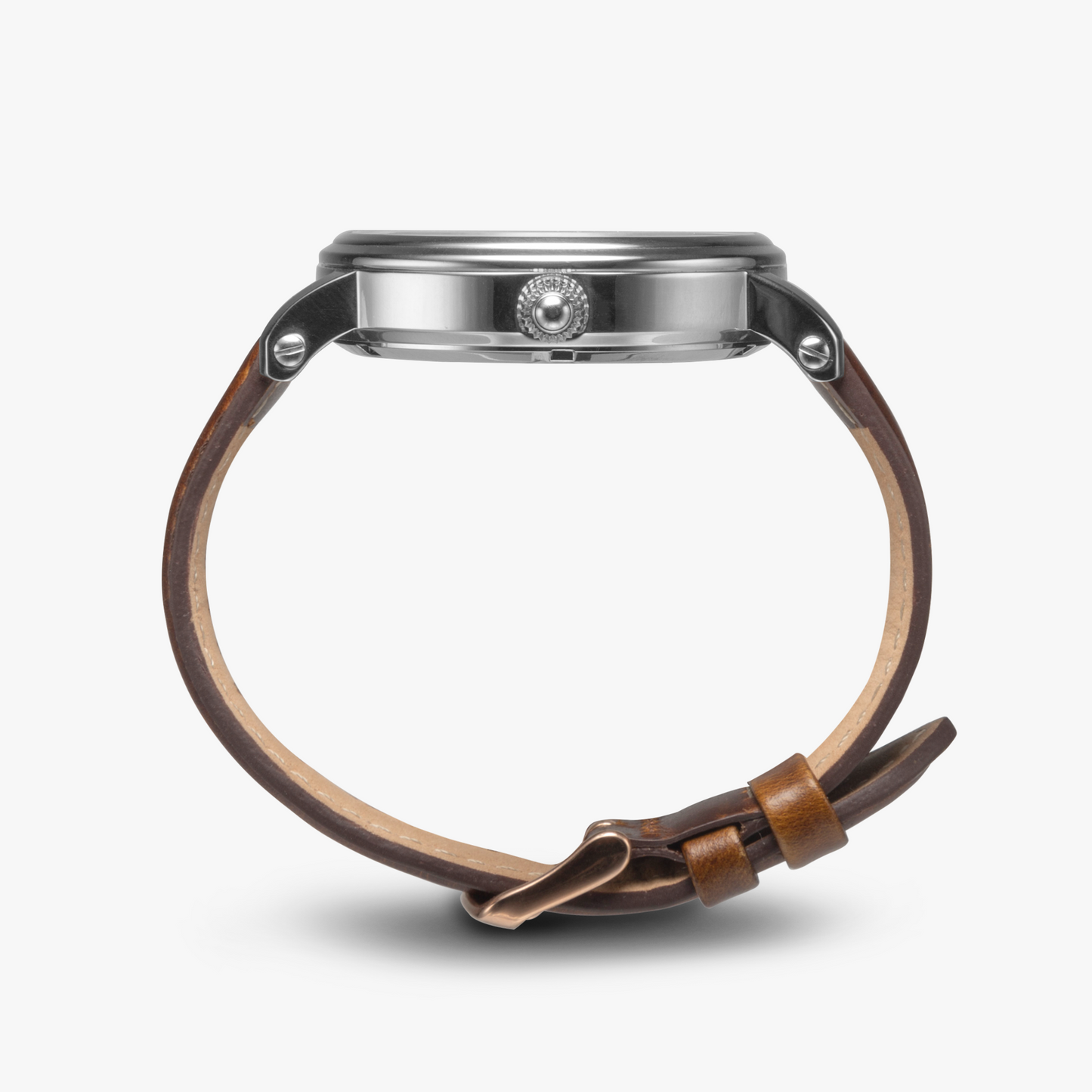 photo showing side of watch with silver face and brown leather band