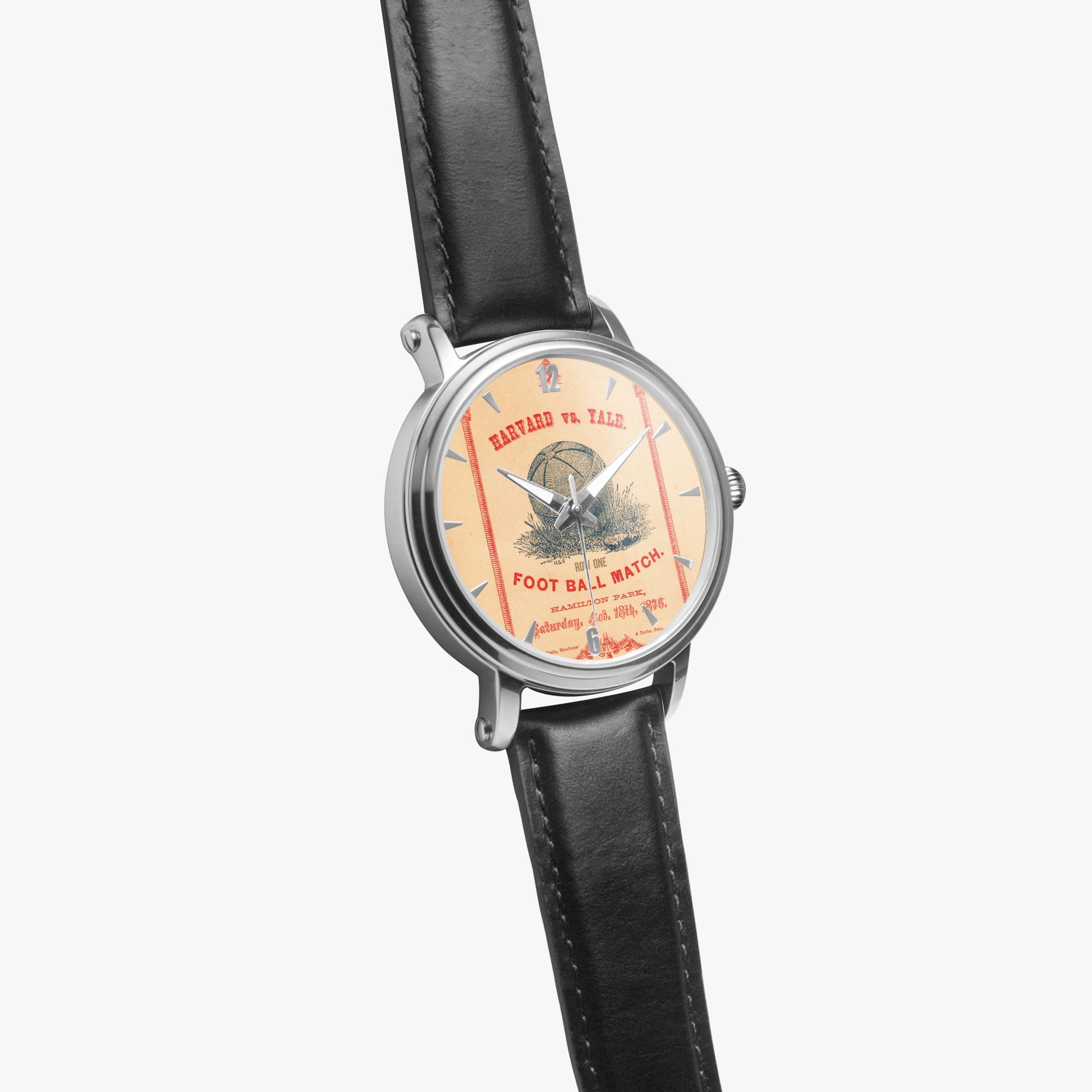 Wristwatch with a vintage-style watch face featuring text and graphics on a white background
