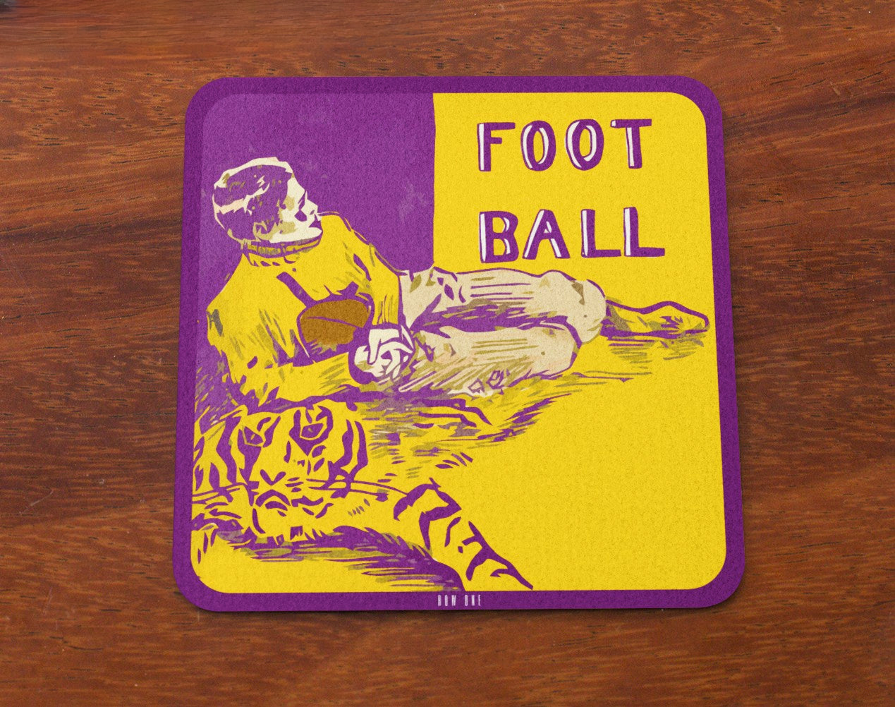 Row One Brand Vintage 1909 LSU Tigers football art birch wood drink coasters with football-themed illustration on a wooden surface