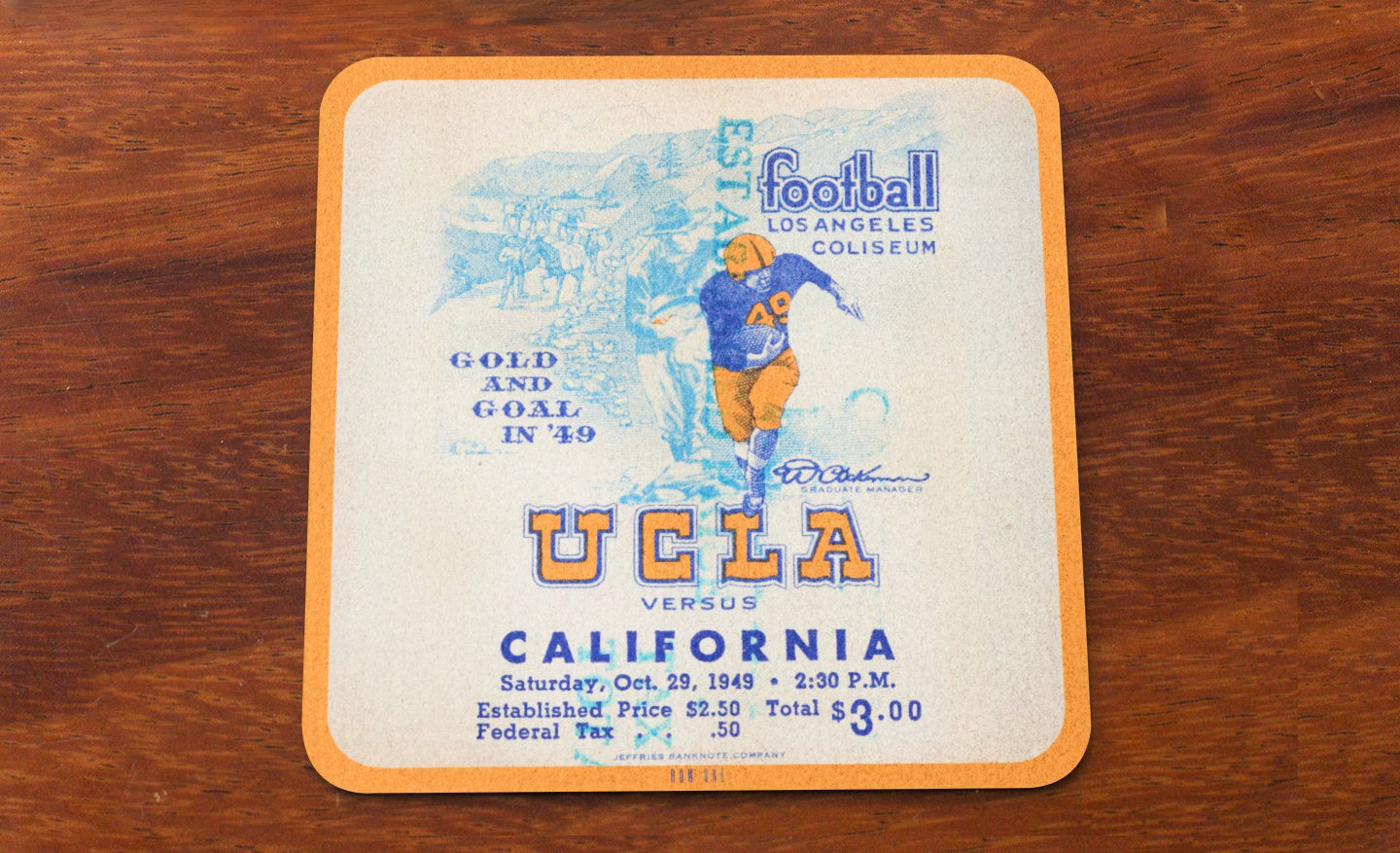 Row One Brand Vintage 1949 football ticket drink coaster for a UCLA vs. California football game on a wooden coaster