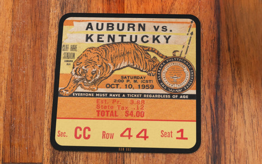 Row One Brand Vintage ticket stub coasters for 1959 Auburn vs. Kentucky football game on a wooden surface