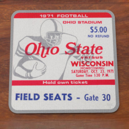 1971 Ohio State vs Wisconsin football game ticket on a wooden surface