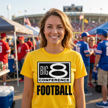 Happy Woman Wearing Row One Brand vintage college tee with retro 1970s Big 8 Conference Football Graphic Standing Outside on a Game Day