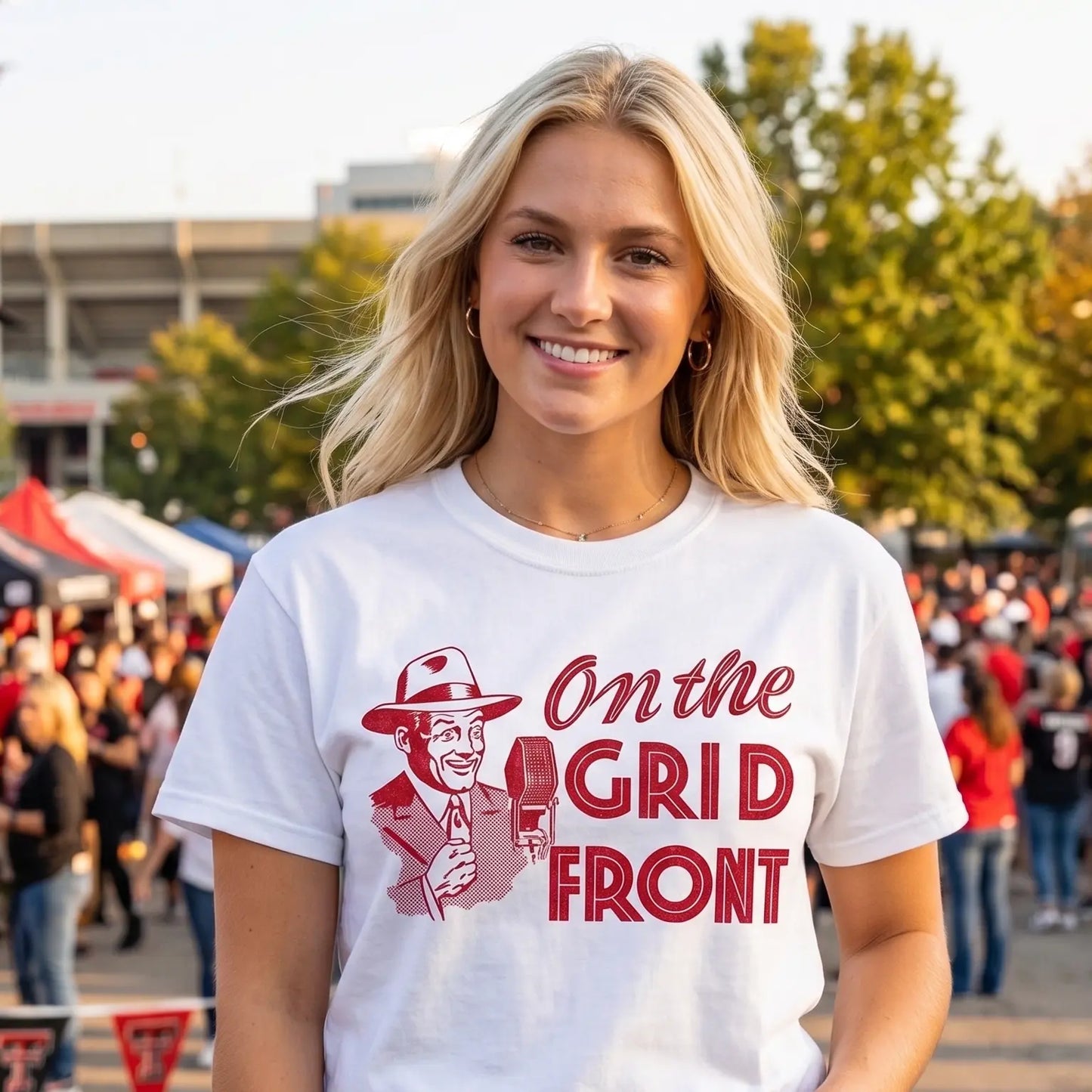 Woman wearing a vintage football tee with On the Grid Front 1940s Football Announcer Graphics