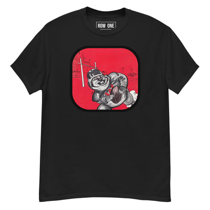 A black short-sleeve crewneck t-shirt featuring a graphic print of a cartoon football player on a red rounded square background, with the brand name 'ROW ONE' printed inside the collar.