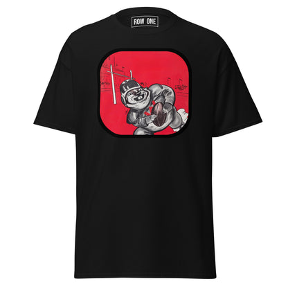 A black short-sleeve t-shirt with a large graphic print on the back. The graphic features a cartoon illustration of a football player on a red background inside a rounded square.