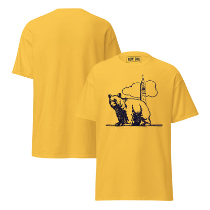 A yellow short-sleeve t-shirt shown from both front and back. The front features a black graphic of a bear standing in front of a cloud-shaped clock tower, with a small 'ROW ONE' brand label printed inside the back collar.