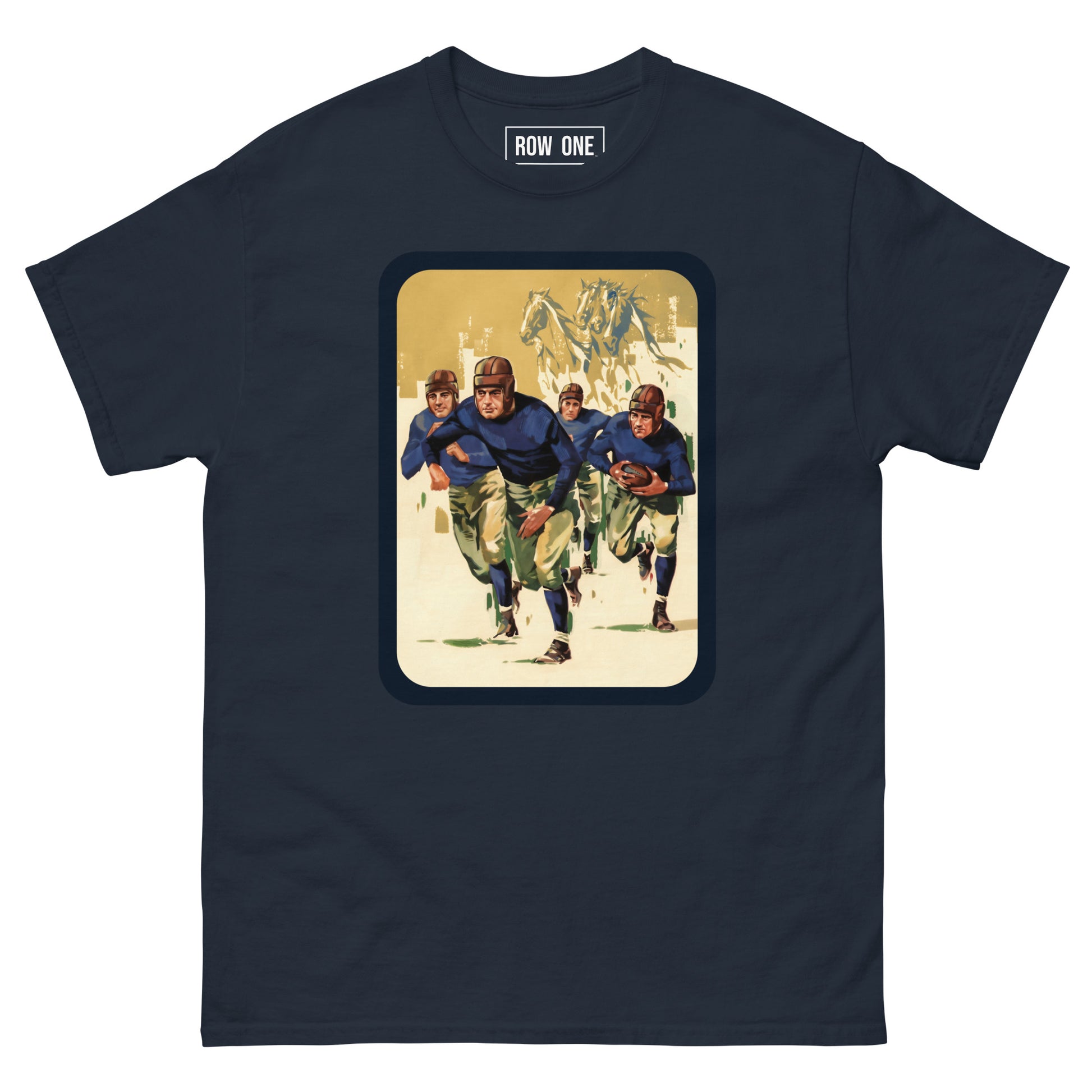 A navy blue crewneck t-shirt featuring a vintage-style graphic print of football players running with a football on a cream-colored background, framed by a dark border. The brand 'ROW ONE' is printed inside the collar.