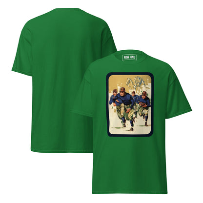 A green short-sleeve t-shirt shown from both front and back. The front features a large rectangular graphic print depicting football players in blue and gold uniforms, while the back is solid green.