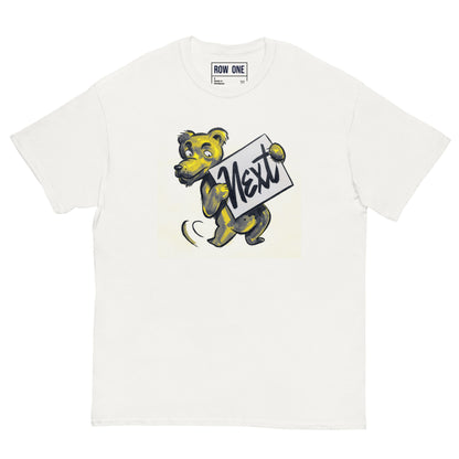 An off-white crewneck t-shirt featuring a graphic of a cartoon bear holding a sign that reads 'Next'. The brand 'ROW ONE' is printed inside the collar.