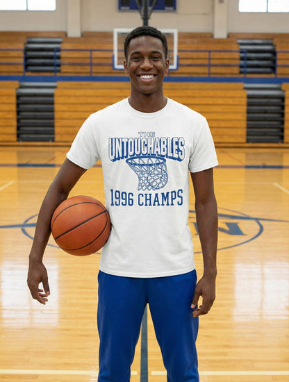 1996 Basketball Untouchables Tee from Row One Brand worn by happy basketball player standing with a basketball in gymnasium