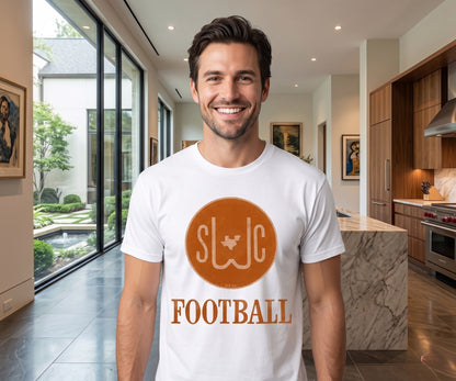 Man wearing a white t-shirt with 'SWC Football' design in a modern kitchen.