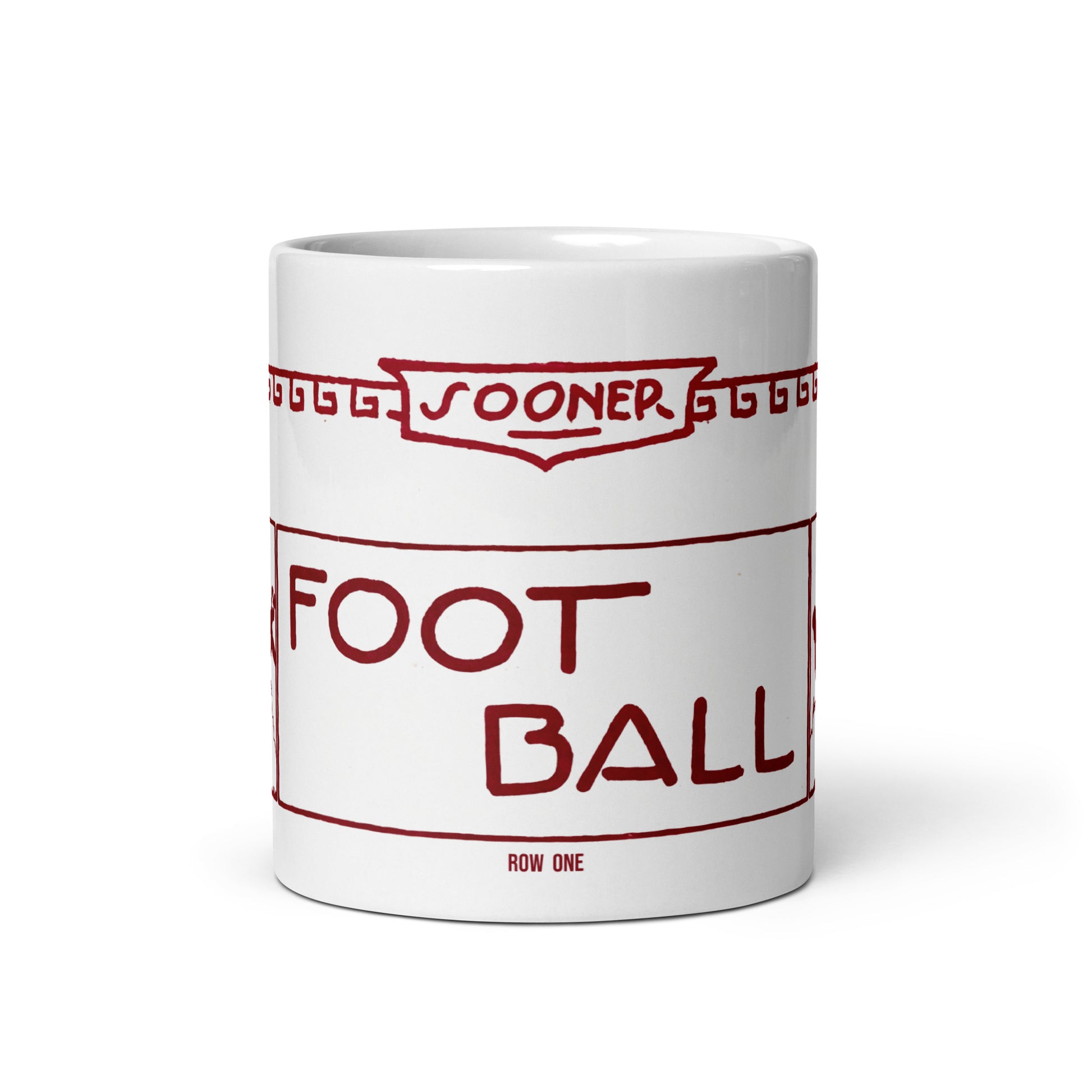 A white ceramic mug featuring a red graphic print styled like a vintage football ticket with the text 'SOONER FOOTBALL' and 'ROW ONE'.