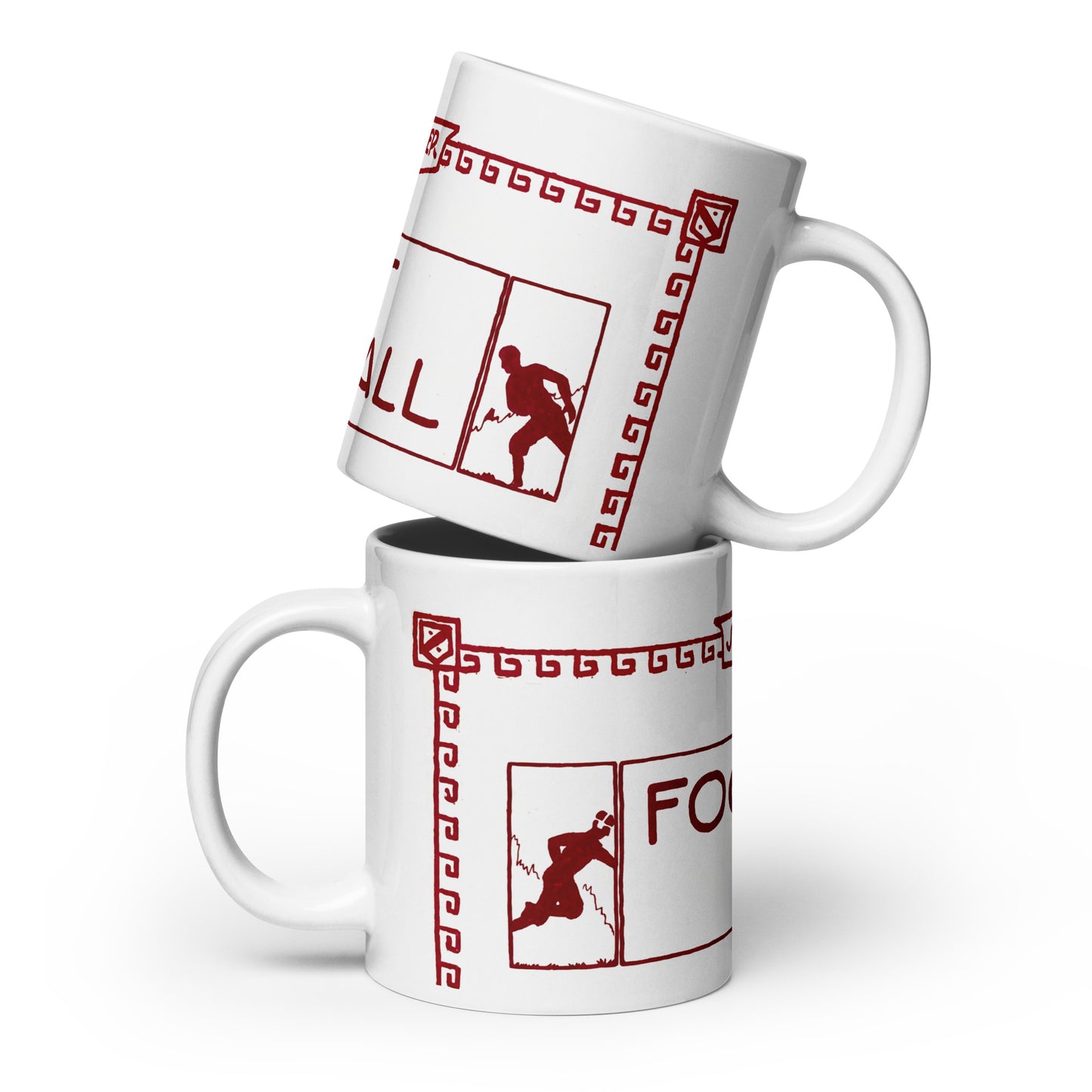 Two white ceramic mugs stacked with a red graphic print featuring a football player silhouette, Greek key border, and partial text on a white background.